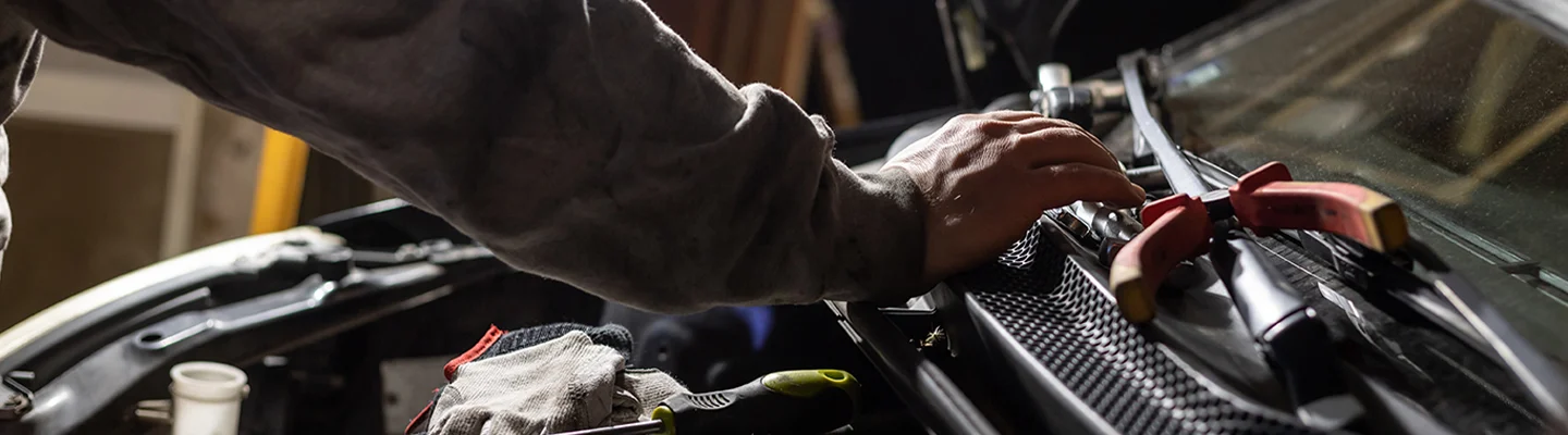 tech working on engine