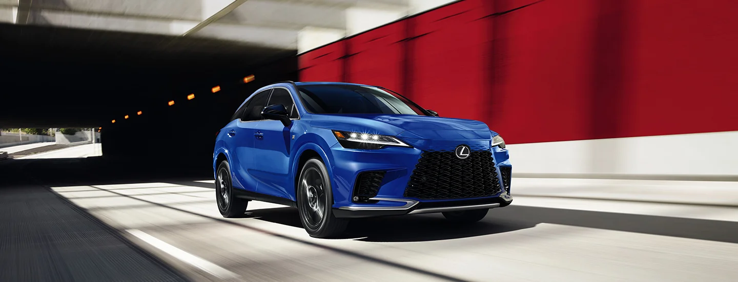 blue 2025 Lexus RX on the road
