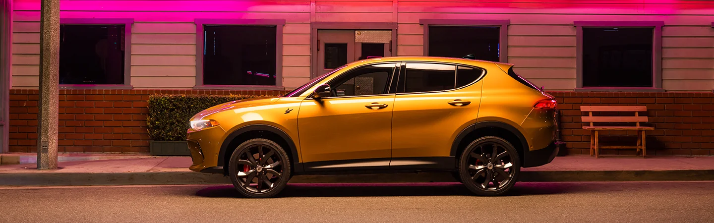 profile of yellow Dodge Hornet