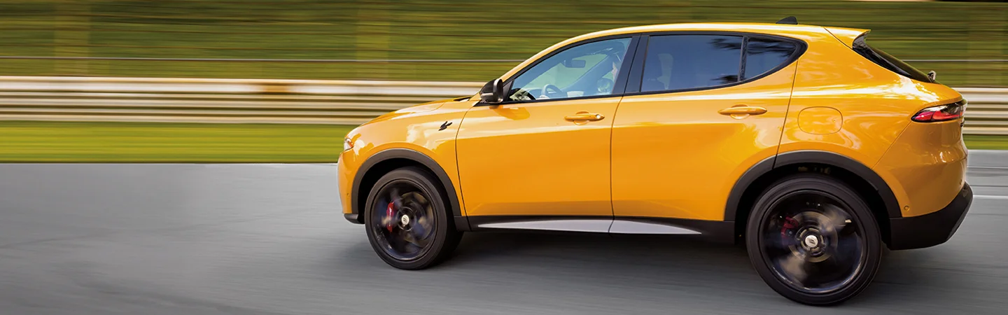 profile of yellow Dodge Hornet