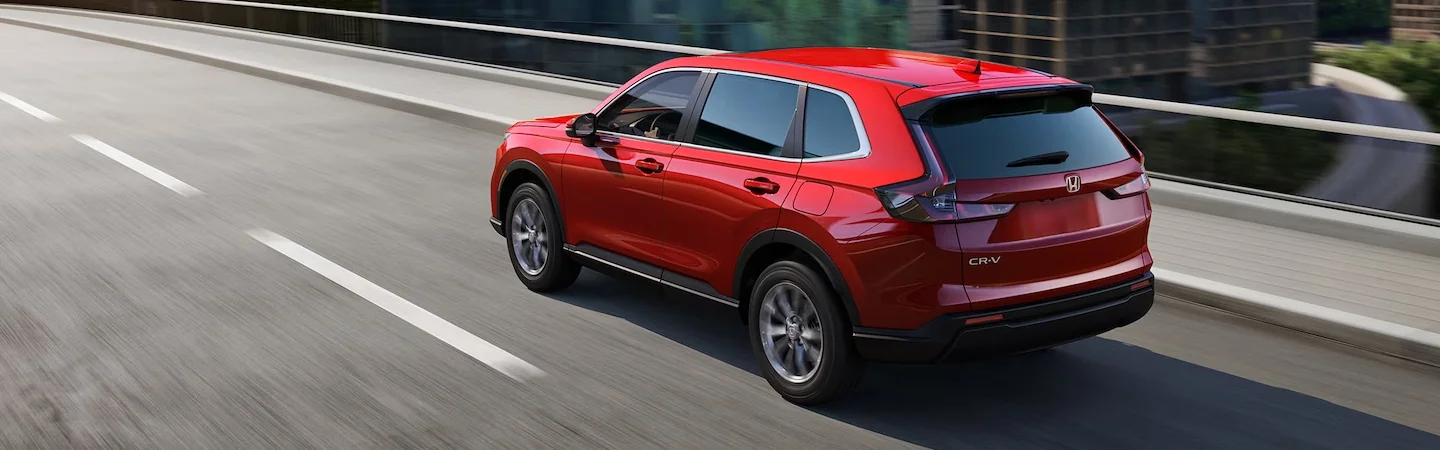 2024 Volkswagen Taos vs Honda CR-V back side red