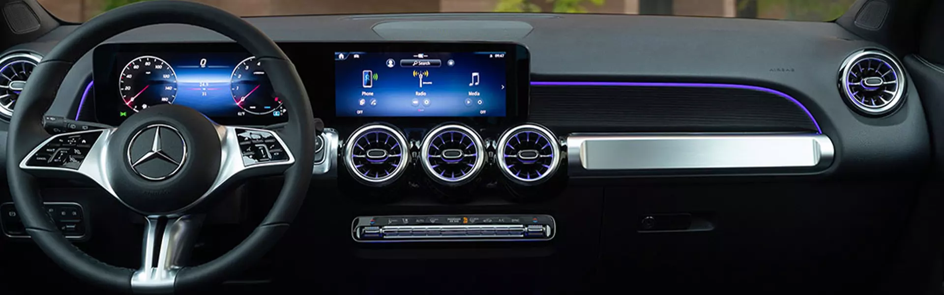 Interior view of the dashboard and tech in a 2026 Mercedes-Benz GLB