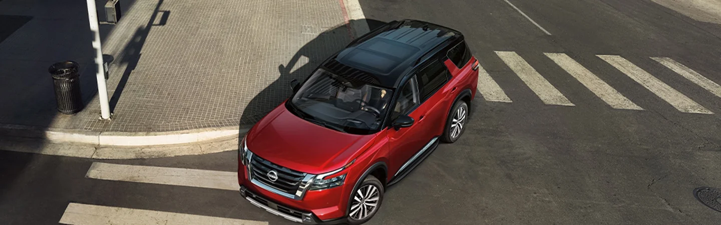2024 Nissan Rogue vs Nissan Pathfinder top side red