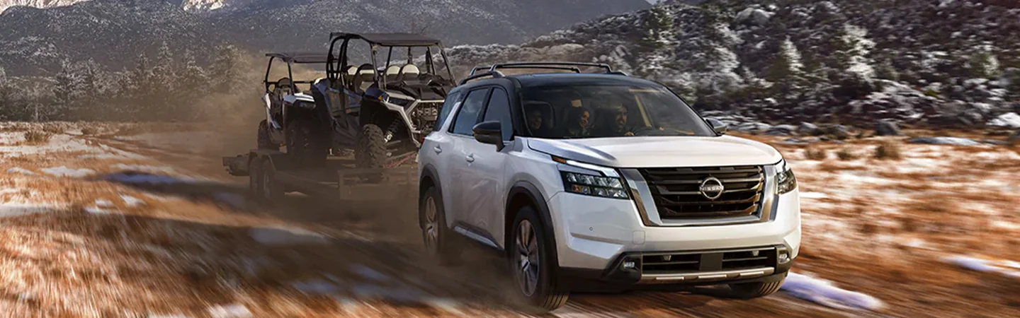 2024 Nissan Rogue vs Nissan Pathfinder front side white