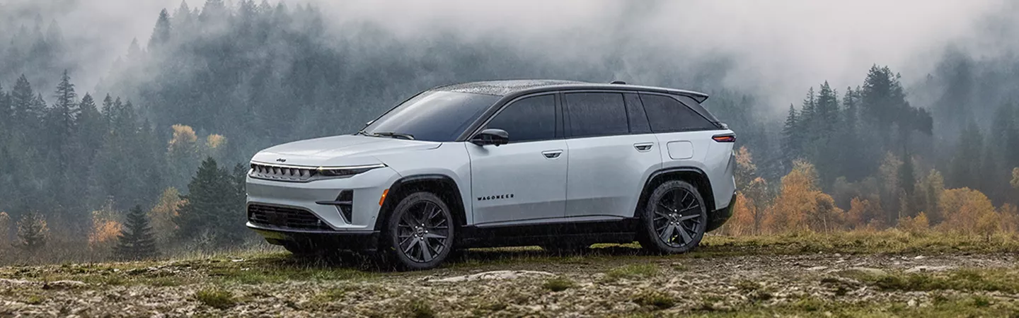 2025 Jeep Wagoneer parked on a misty mountaintop