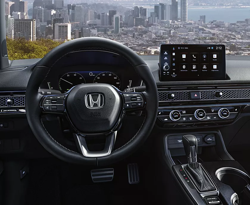 Interior view of the dashboard and tech inside a 2027 Honda Civic