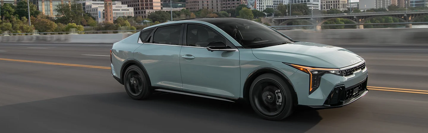 2025 Kia K4 Specs sliver color side front view