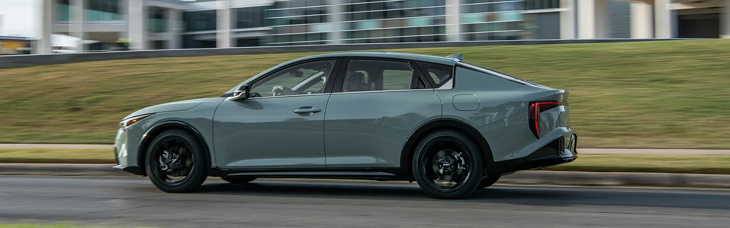 2025 Kia K4 Specs sliver color side front view
