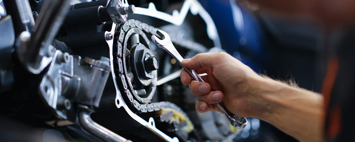 Service tech working on a engine