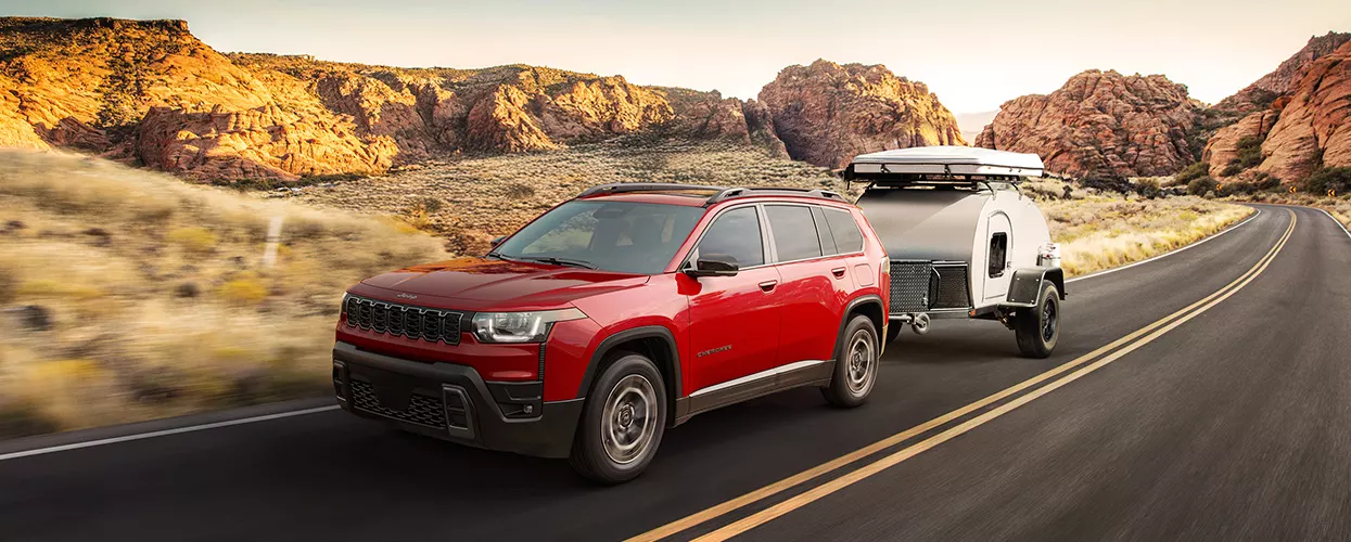 Jeep Cherokee towing a small trailer