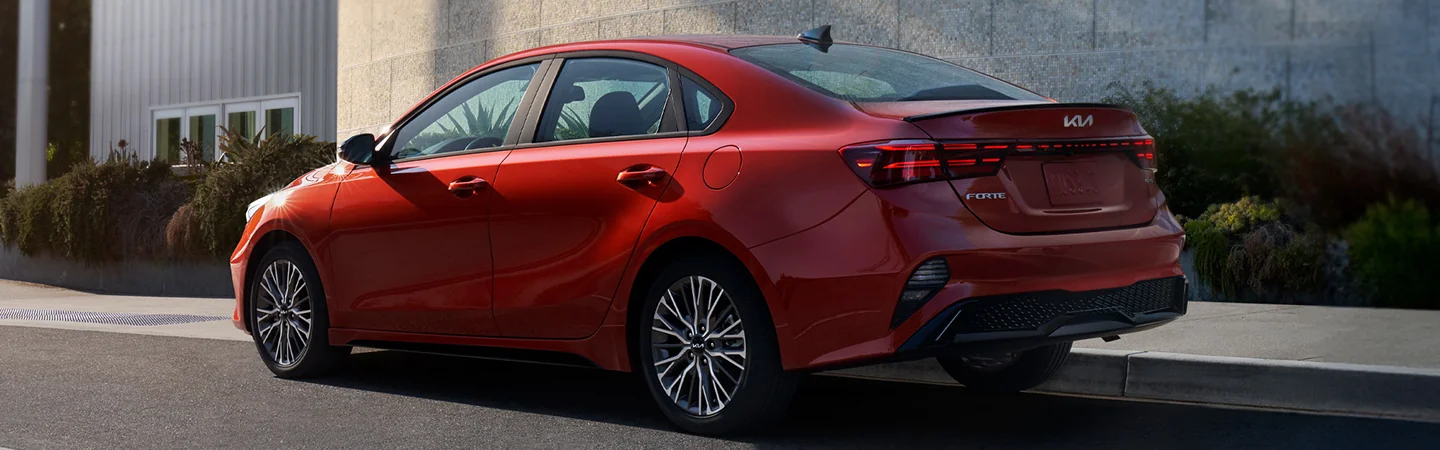 2024 Kia Forte Specs back side view red