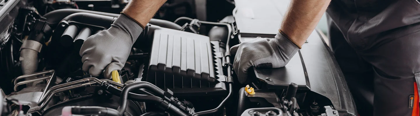 Mechanic servicing a vehicle at Bob Bell Ford