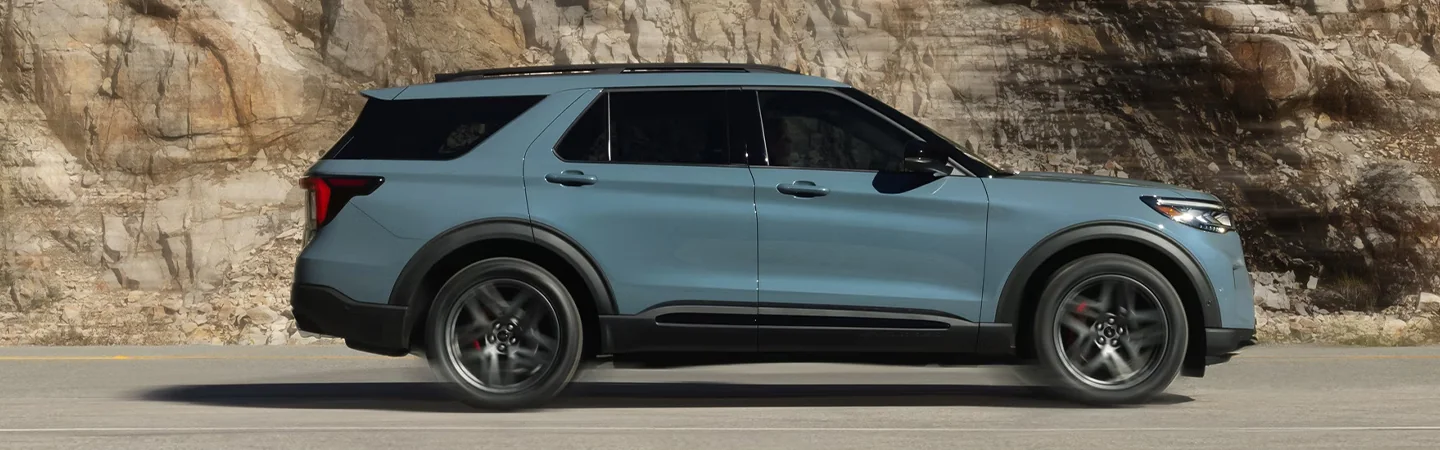 Side view Ford Explorer SUV in motion