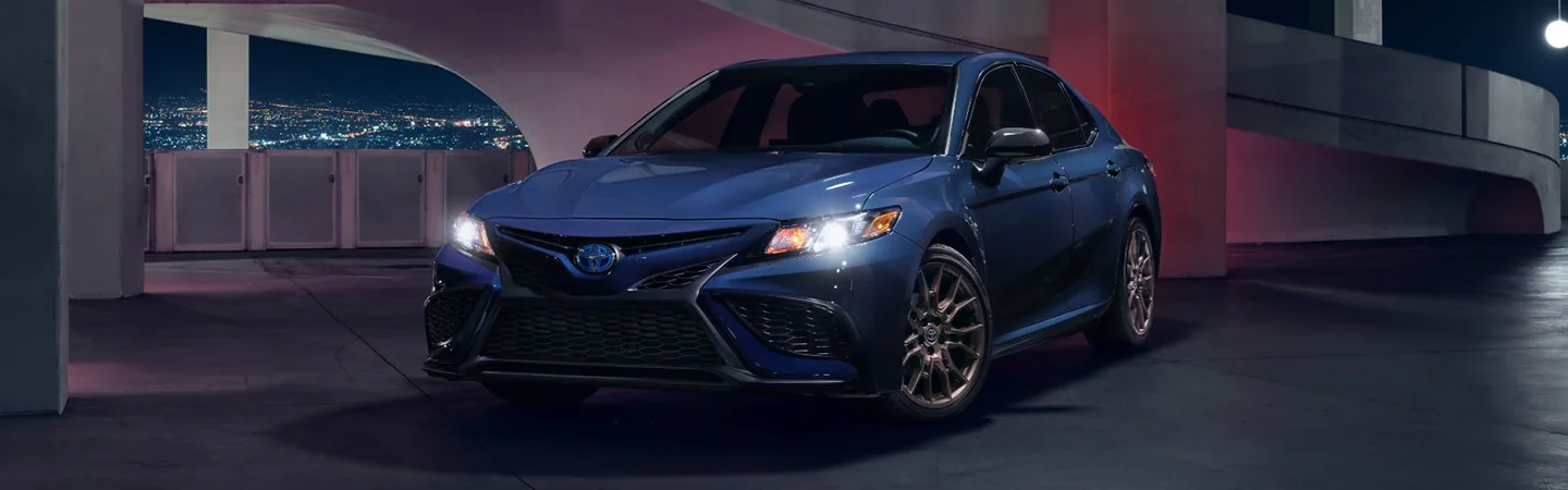 2024 Hyundai Elantra vs Toyota Camry front blue