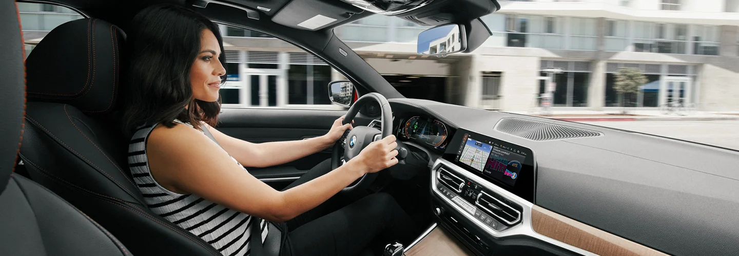 2025 BMW 3 Series woman driving