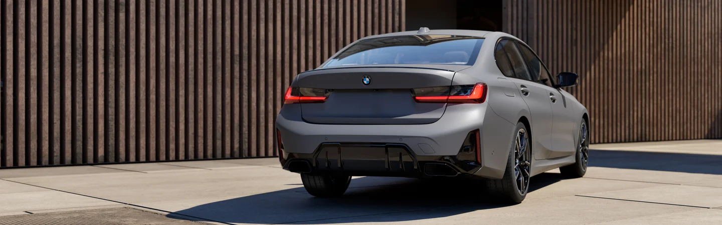gray 2025 BMW 3 Series parked back view