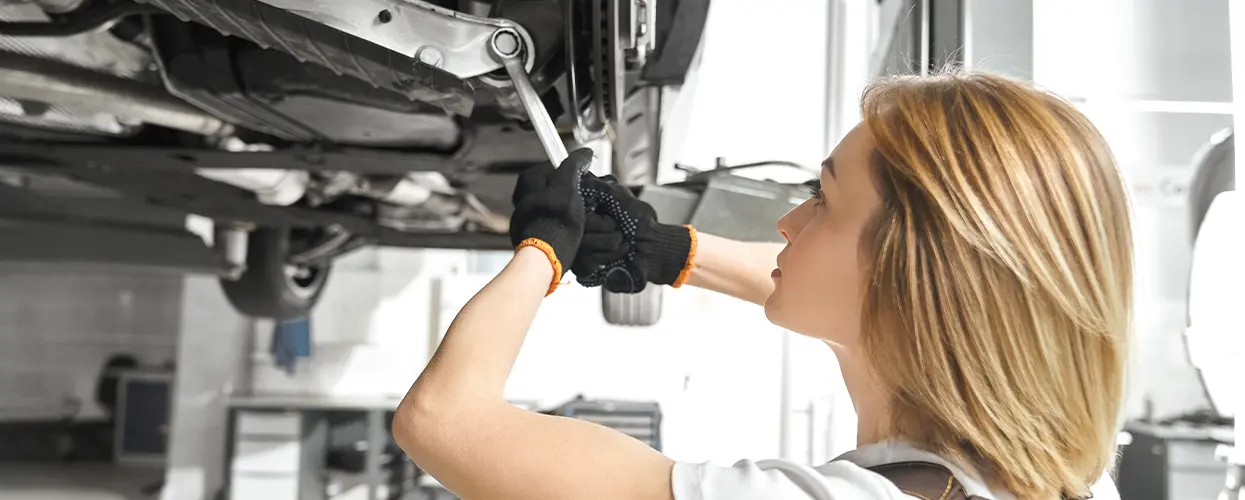 tech working on car