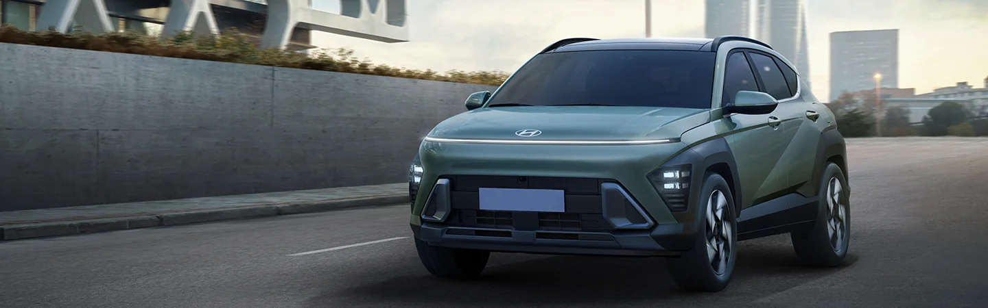 2025 Hyundai Kona driving in a city
