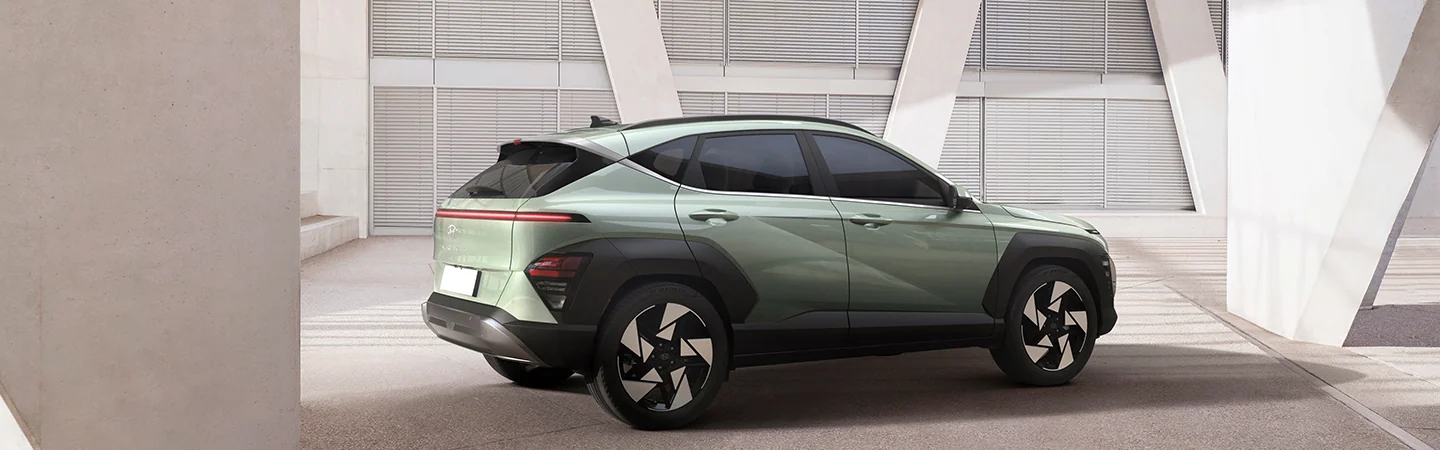 2025 Hyundai Kona parked next to a building
