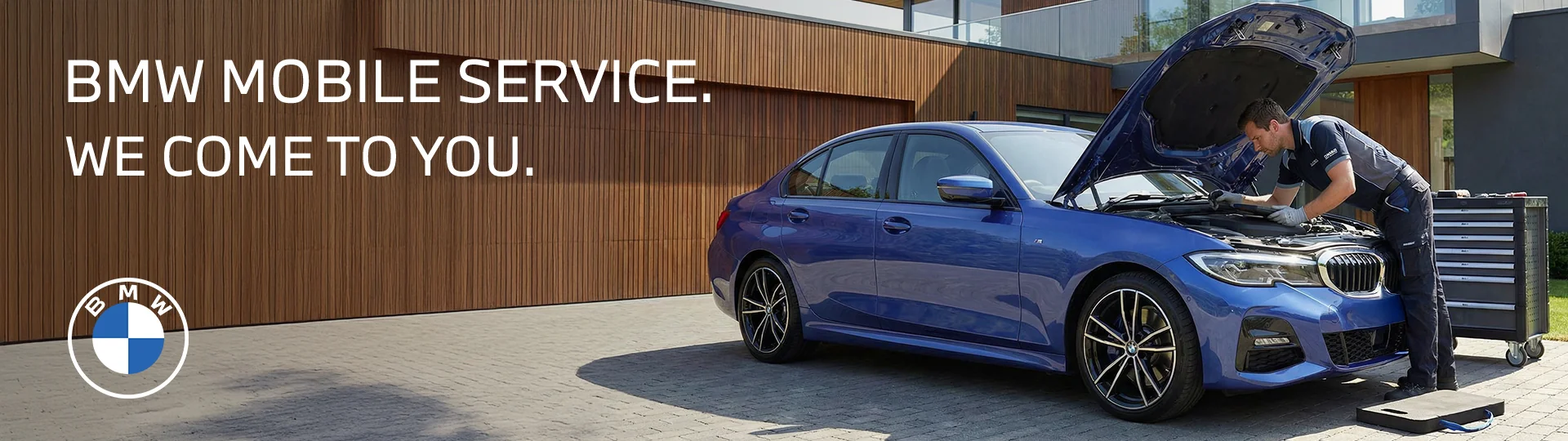 BMW Mobile service - We come to you - BMW service tech doing service at a customes home