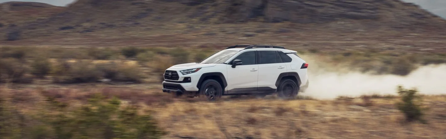 2024 Hyundai Tucson vs Toyota RAV4 whitecolor sideview