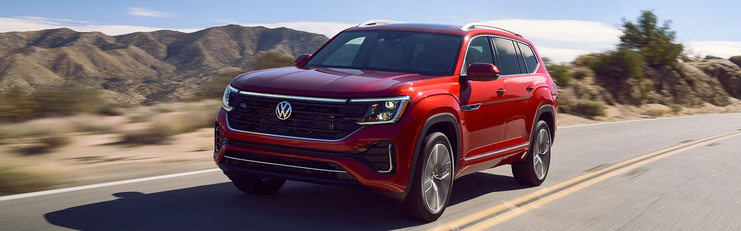 Volkswagen Atlas red color running on road