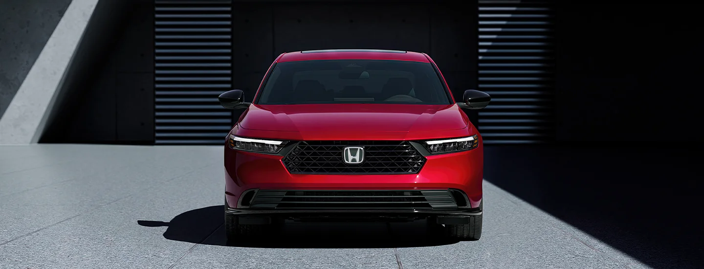 Front view of a parked red 2025 Honda Accord