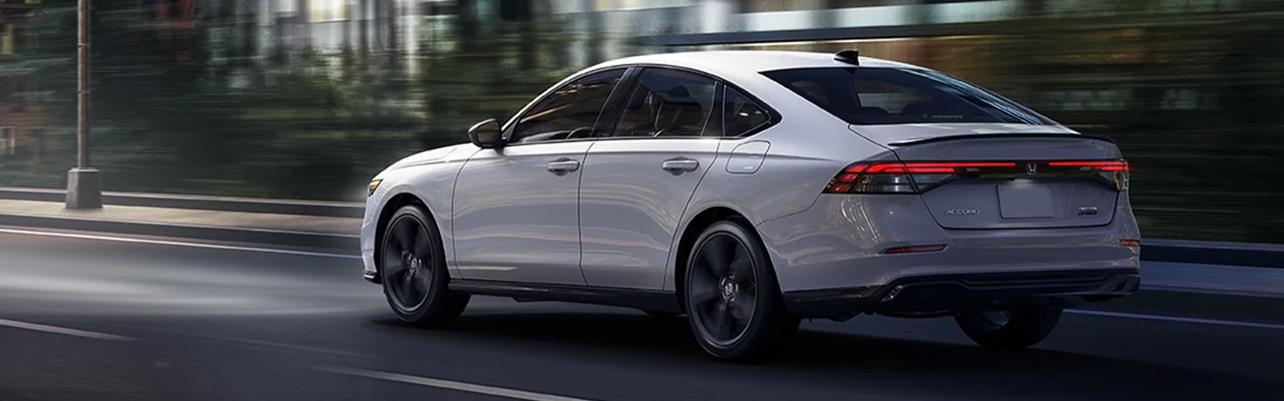 side view of a gray 2025 Honda Accord driving on the street