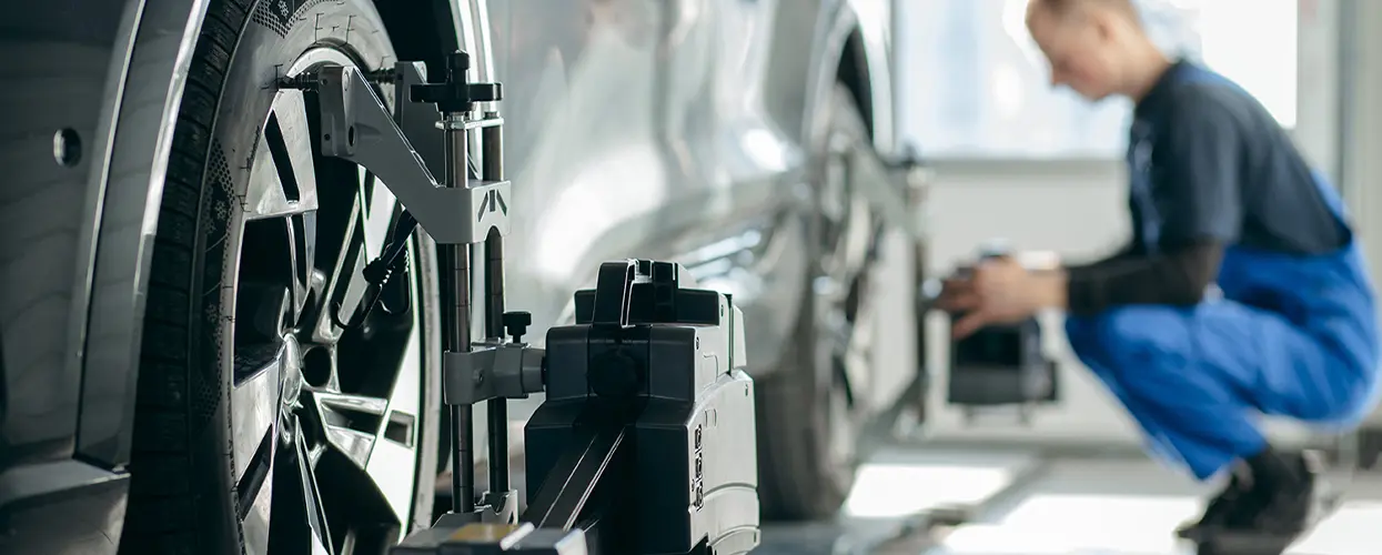 technician balancing tires