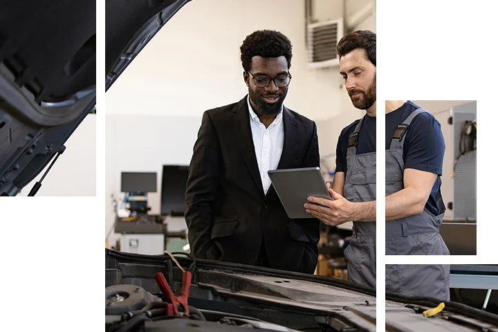 men looking over engine