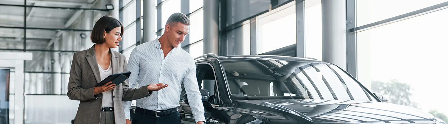 agents in showroom car shopping