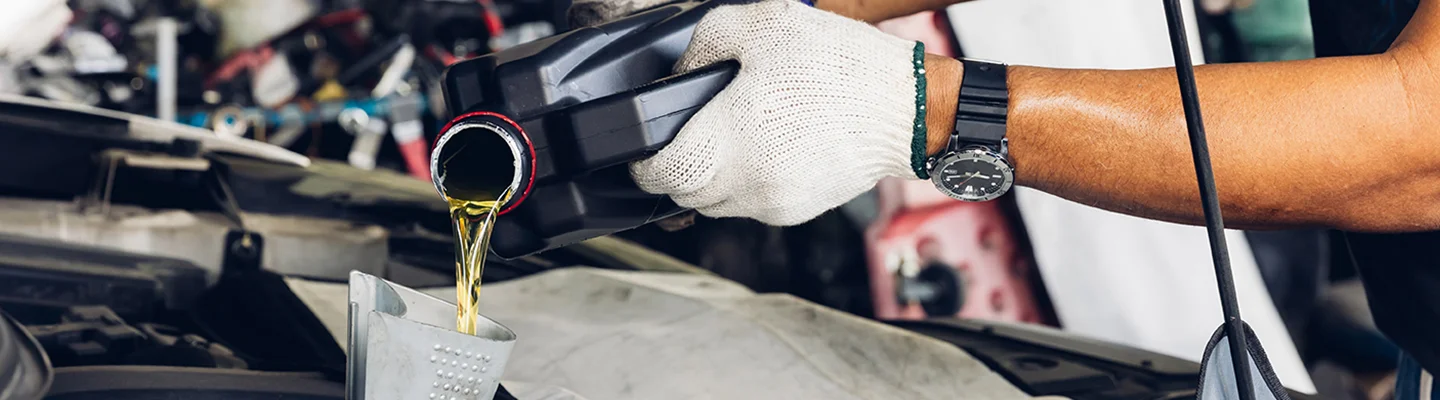 adding oil to engine
