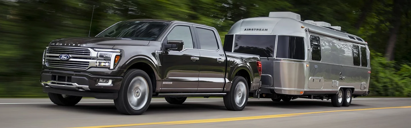 2024 Ford F-150 vs Ford F-150 Lightning black color front  view