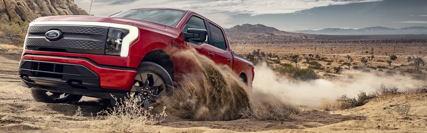 2024 Ford F-150 vs Ford F-150 Lightning red color front view