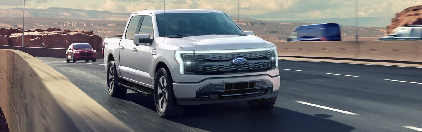 2024 Ford F-150 vs Ford F-150 Lightning white color front view