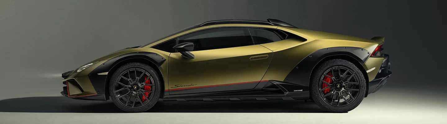 side view of a gold colored Lamborghini Huracán Sterrato