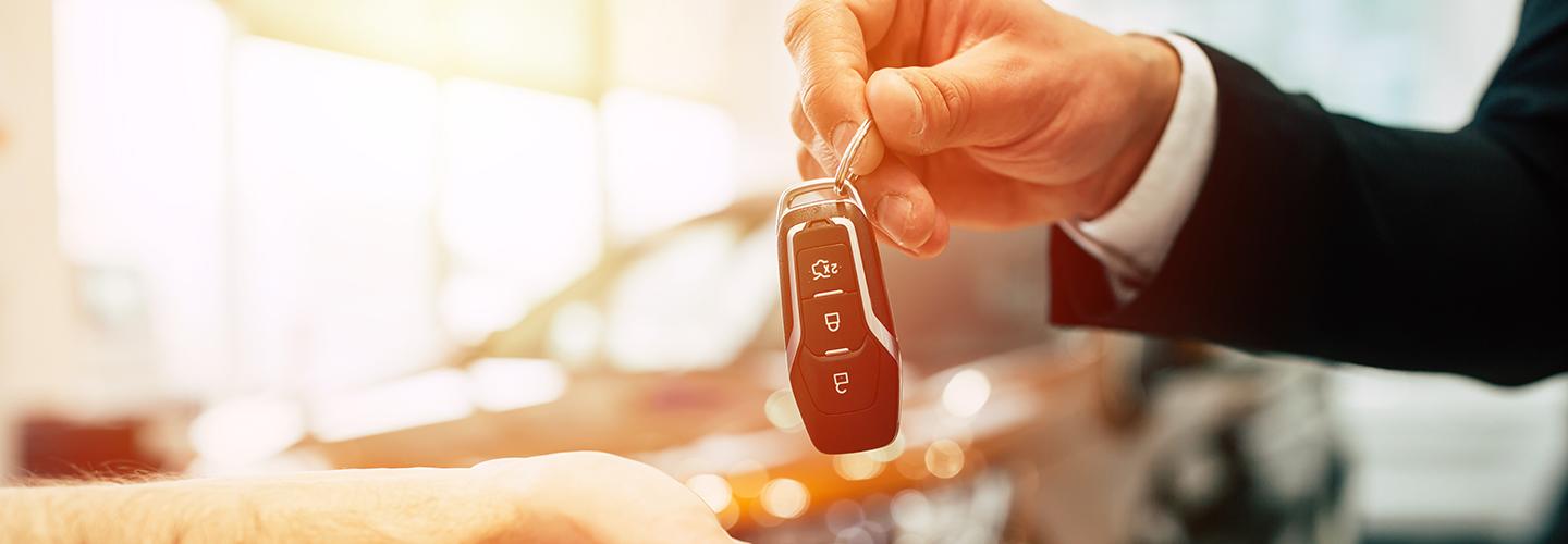handing over keys to a car