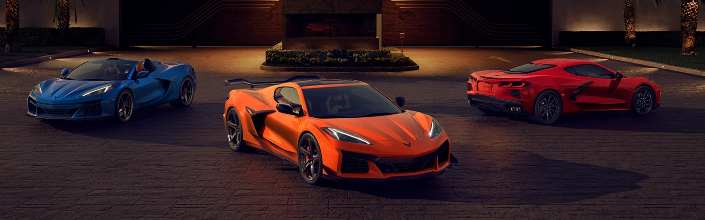 Blue Orange Red Chevrolet Corvette parked outside the house