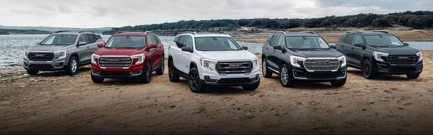 2024 GMC Terrain vs Honda CR-V front view  brown red white black grey