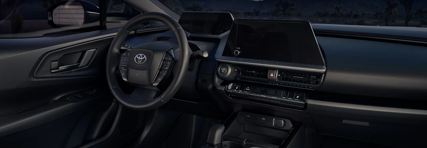 Interior view of the dashboard and tech in a 2026 Toyota Prius
