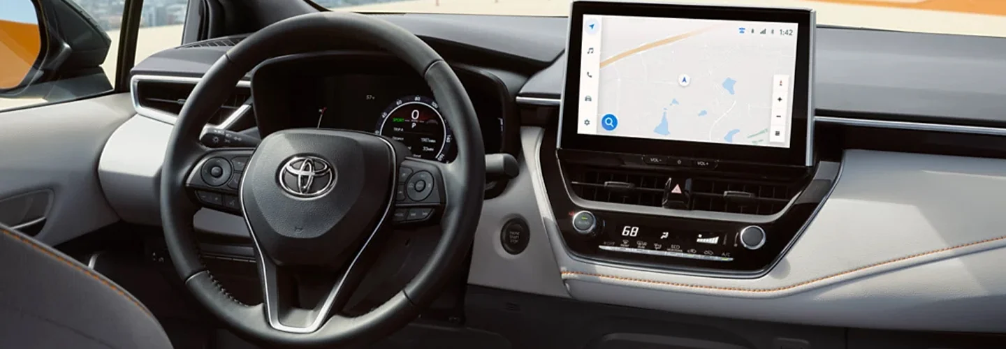 Interior view of the dash and tech of a 2024 Toyota Corolla