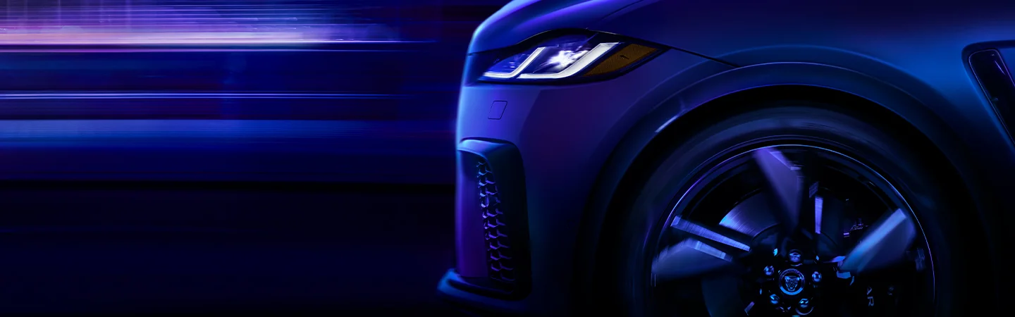 blue 2025 Jaguar F-PACE headlight