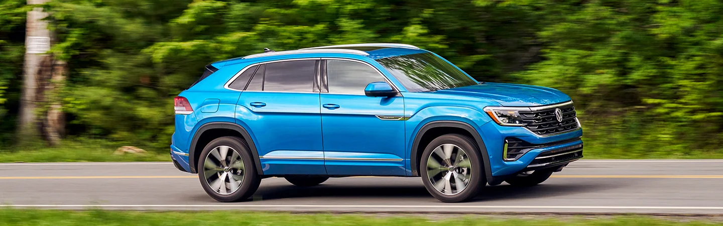 2025 VW Atlas vs Atlas Cross Sport blue color car on road