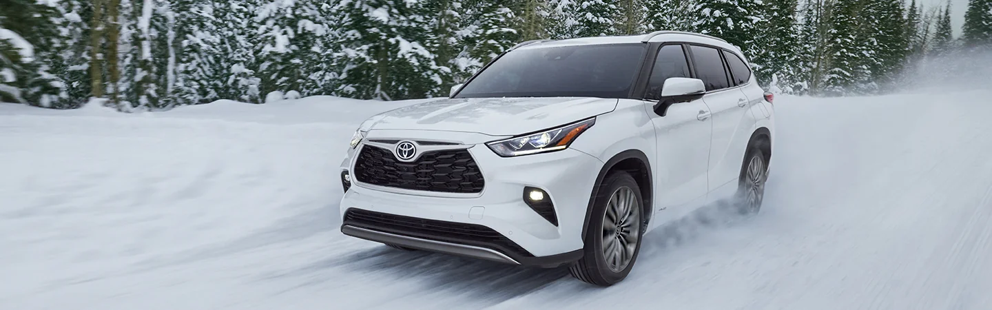 2025 Toyota Highlander White color car on Snow