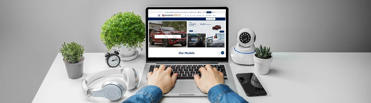 Person shopping online for a new Volkswagen