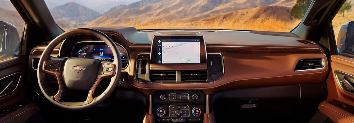 Interior view fo the dashboard and tech of a 2024 Chevrolet Tahoe