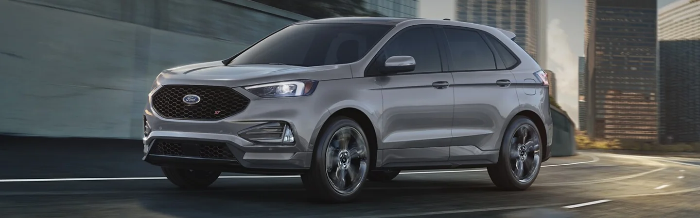 2024 Ford Edge vs 2024 Chevy Blazer front side in silver