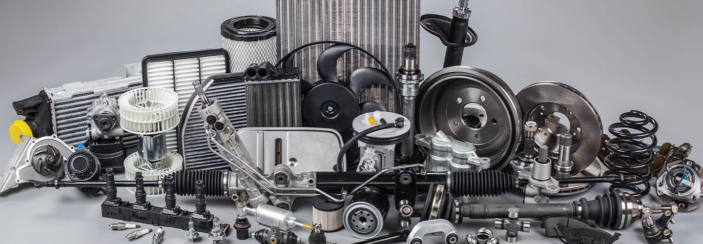 table with many car parts on display