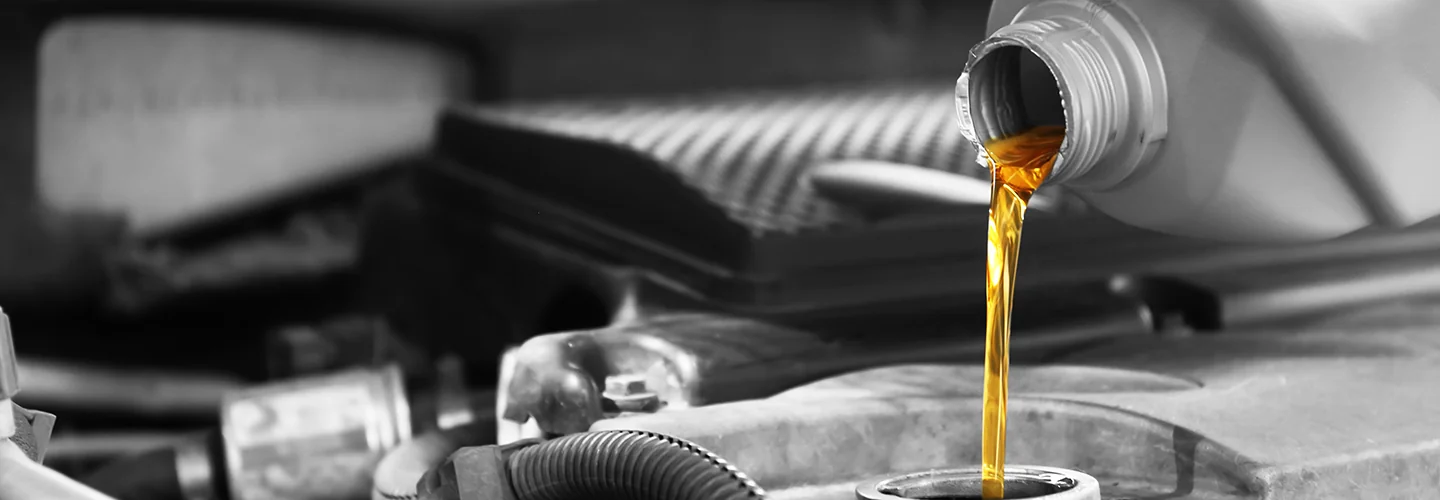 oil being poured into engine