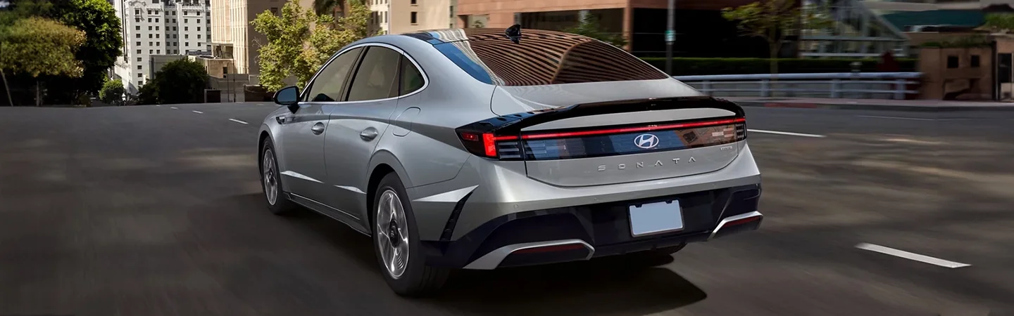 Hyundai Sonata Hybrid rear view on road